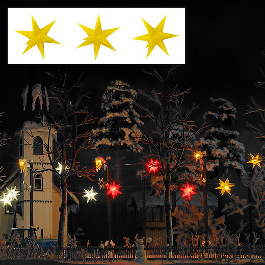 Drei gelb leuchtende Weihnachtssterne