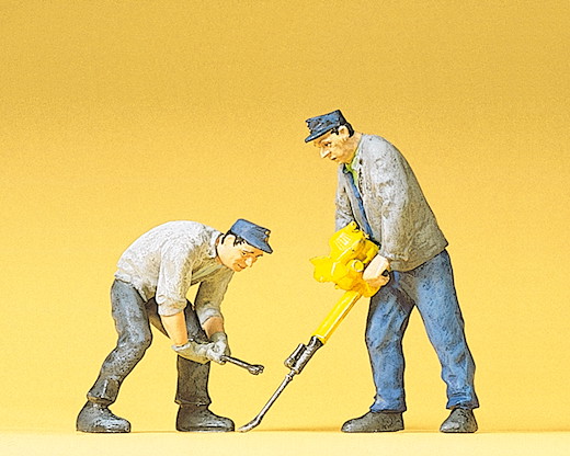 2 Gleisbauarbeiter mit Gleisstopfgerät + Gabelschl.