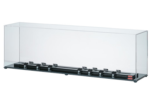 Vitrine mit Rollenprüfstand