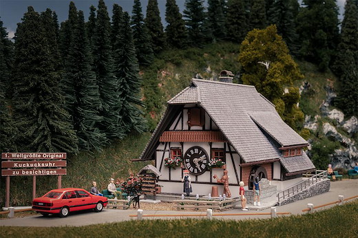 Jubiläumsmodell 1. Weltgrösste Kuckucksuhr mit Figur